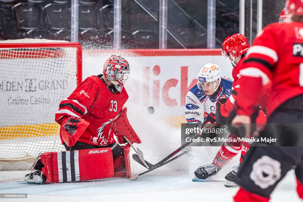 Kevin Rohrer Vinzenz Rohrer of ZSC Lions tries to score against goalie Kevin... News ...