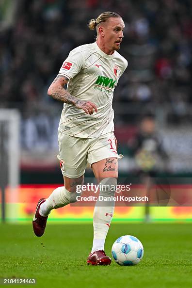 Mwolf Marius Wolf of Augsburg in action during the Bundesliga match between ...