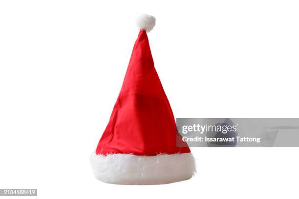 a red hat with a white stripe - santa hat stock pictures, royalty-free photos & images