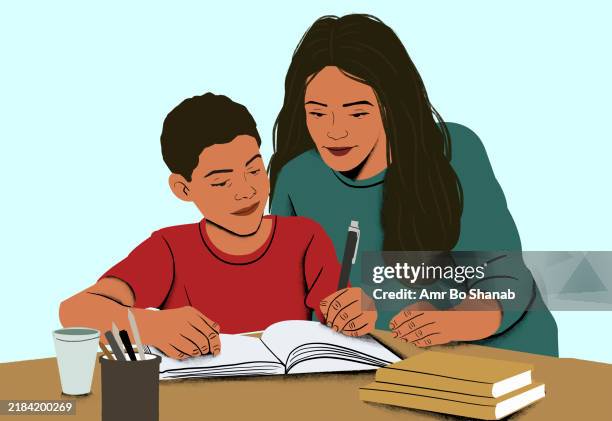 a young woman helps a boy with his studies, both concentrating on a notebook on the table with a cup and stationery holder beside it - study guide stock illustrations