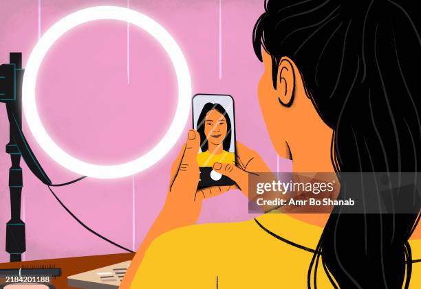 a woman records a vlog with her smartphone, using a ring light for better lighting - content creation stock illustrations