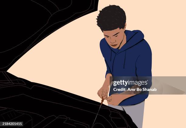 a young man checking under the hood of a car with a focused expression - checking car stock illustrations