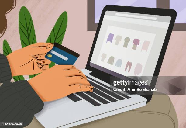 hands holding a credit card and typing on a laptop with online shopping interface displayed on the screen - using debit card stock illustrations