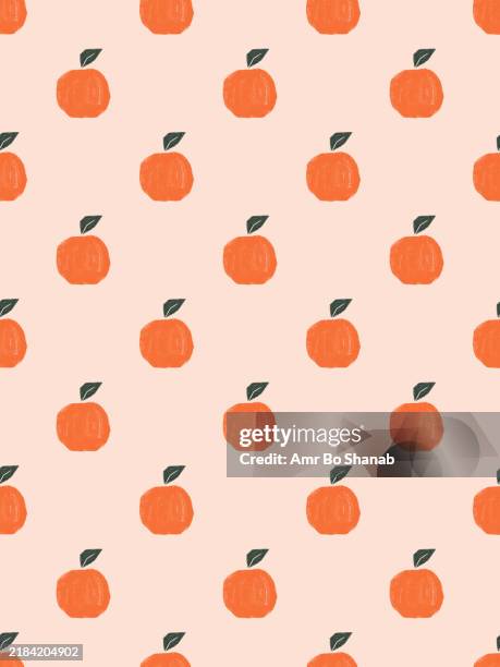 seamless pattern of stylized red apples on a pink background - red fruit pattern stock illustrations