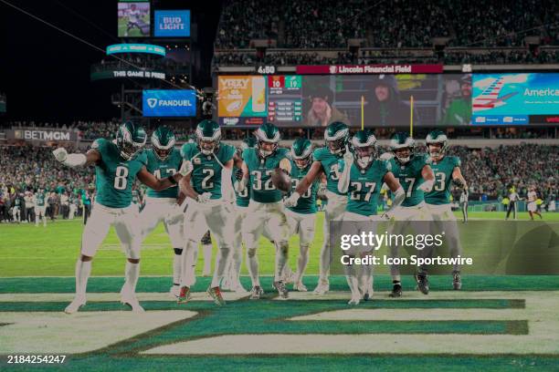 Philadelphia Eagles defense celebrate a turnover during the game between the Philadelphia Eagles and the Washington Commanders on November 14, 2024...