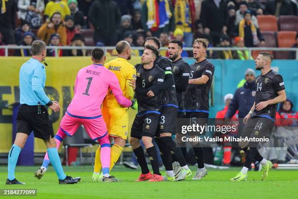 Players of Romania clashes with players of Kosovo during the UEFA Nations League 2024/25 League C Group C2 match between Romania and Kosovo at on...