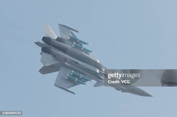 The J-15D carrier-borne electronic warfare aircraft flies in the sky during the 15th China International Aviation and Aerospace Exhibition, or...