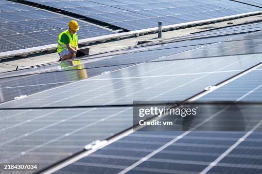 Engineer Configures Solar Panel Array with Technology Tools Engineer Configures Solar Panel Array with Technology Tools