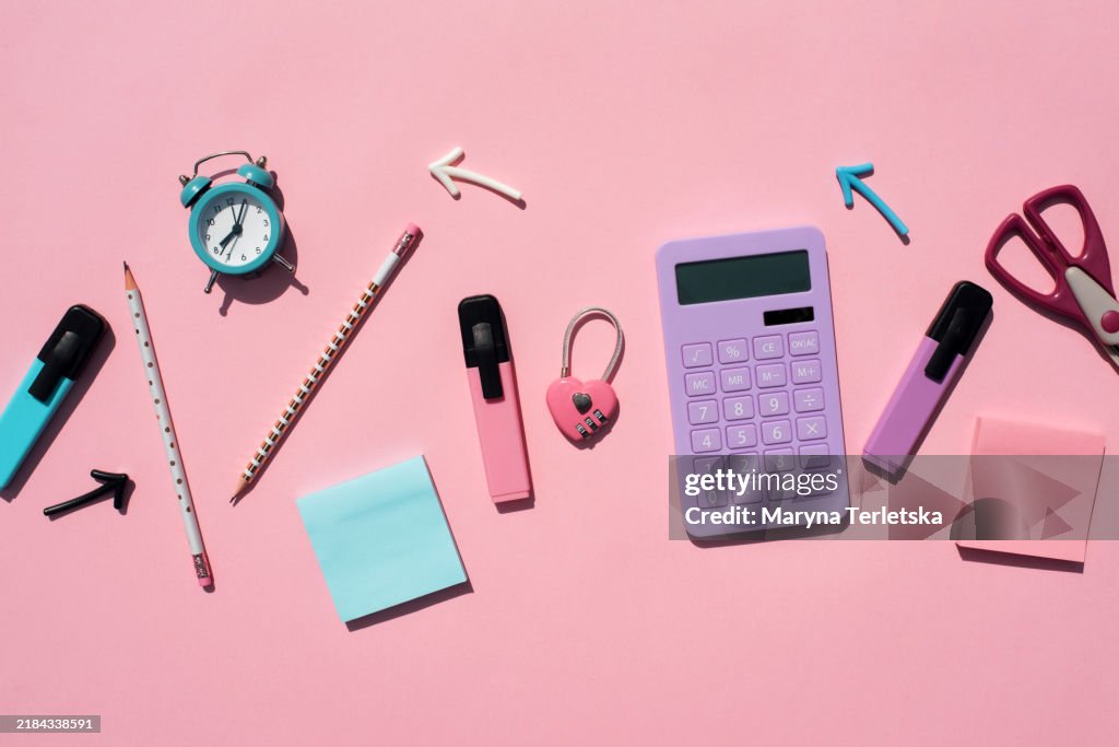 Flat lay with pink-violet office. Universal stationery office background. Stationery background. Back to school. University. Education.