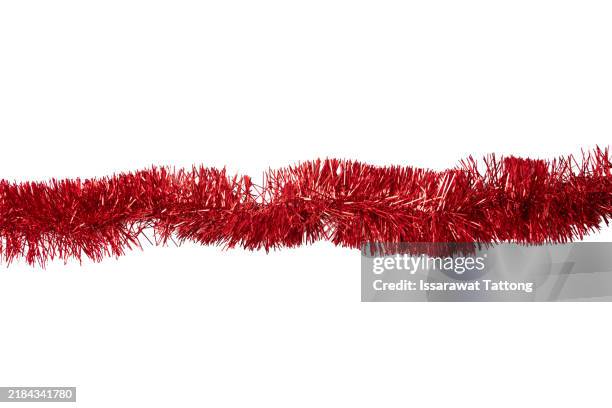 a red ribbon is shown on a white background - tinsel stock pictures, royalty-free photos & images