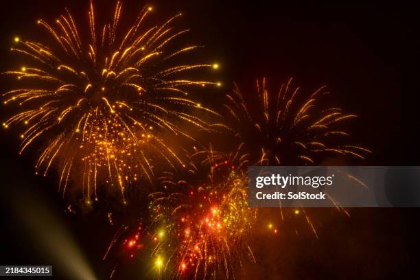 celebrating an event with fireworks - raket bildbanksfoton och bilder