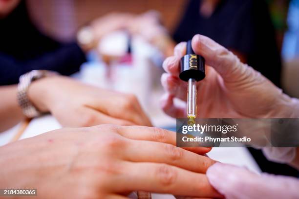 women having manicure at beauty spa - pedicure nail art stock pictures, royalty-free photos & images