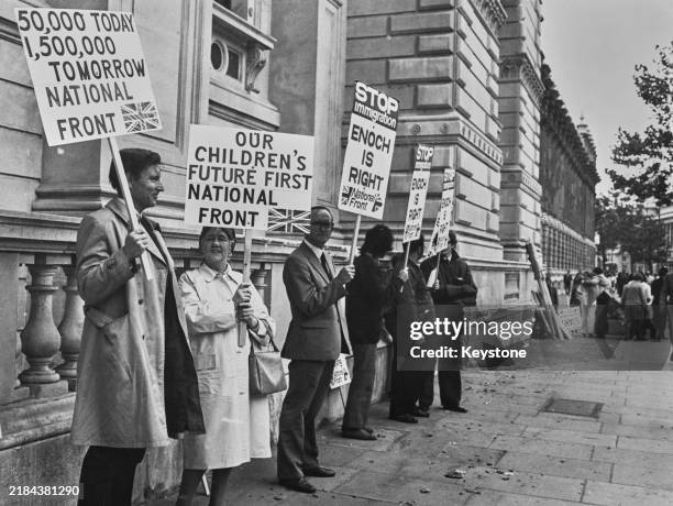 Demonstrators outside the Home Office with placards protesting against Asian immigration, London, 18th August 1972. The demonstration has been...