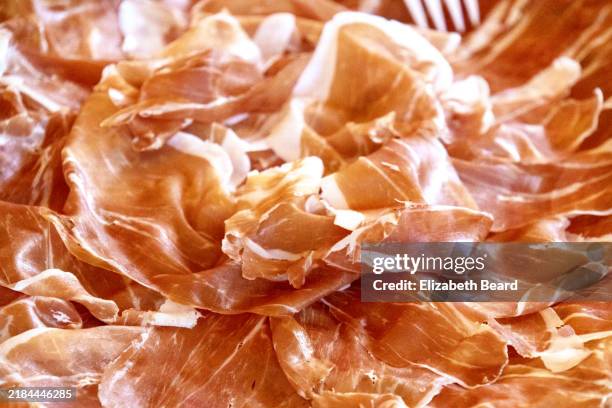 sliced parma ham - parma ham stock pictures, royalty-free photos & images