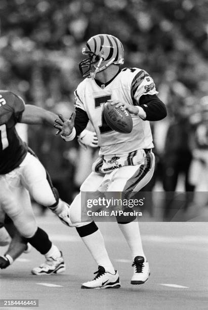 Quarterback Boomer Esiason of the Cincinnati Bengals looks to pass the ball in the game between the Cincinnati Bengals vs the Philadelphia Eagles at...