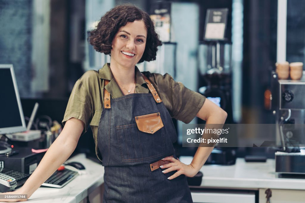 Confident coffee shop owner