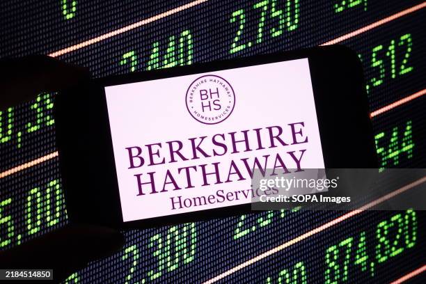 In this photo illustration, the Berkshire Hathaway company logo is seen displayed on a smartphone screen.