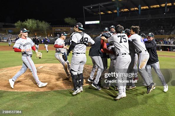 Salt River Rafters Members of the Salt River Rafters celebrate after defeating the... News ...