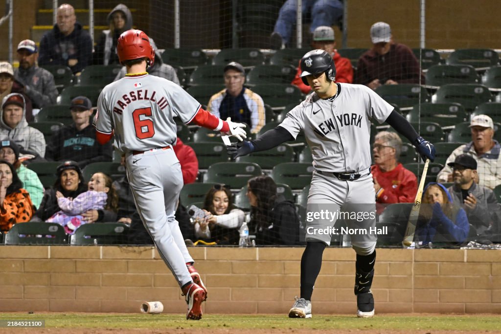 Salt River Rafters Robert Hassell III of the Salt River Rafters celebrates with Antonio ...