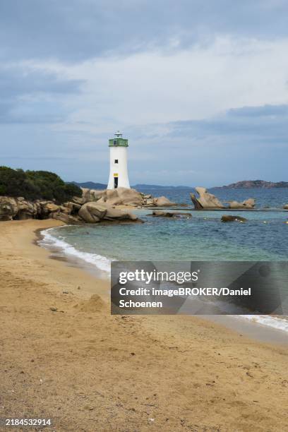 lighthouse with beach and bizarre granite rocks, spiaggia porto faro, faro di punta palau, palau, sardinia, sardinia, italy, oceania - punta palau lighthouse stock pictures, royalty-free photos & images