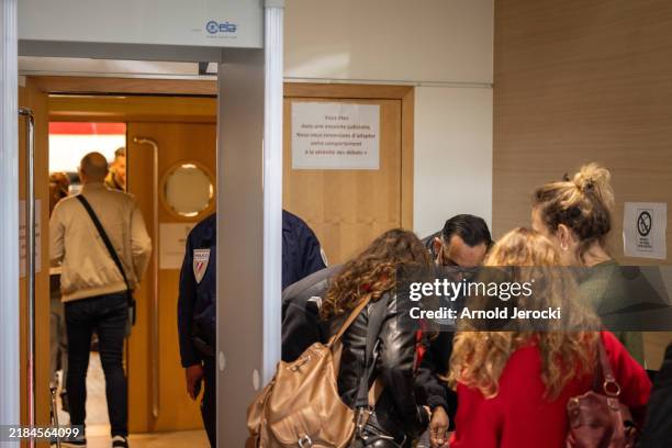 Journalists attend the Dominique Pelicot trial on November 13, 2024 in Avignon, France. A trial currently taking place at the Avignon court accuses...