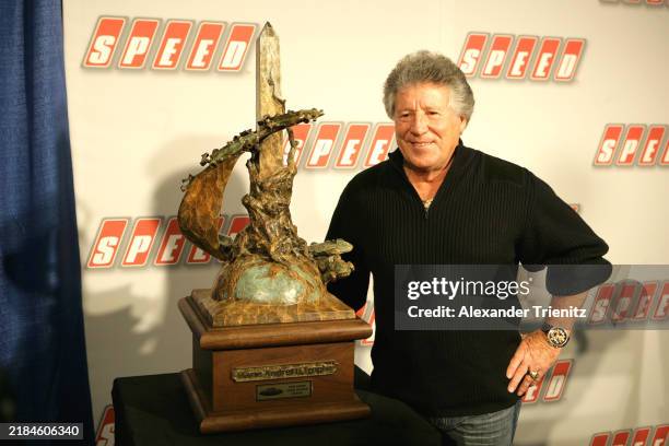 Mario Andretti with the trophy bearing his name. 27th NASCAR Sprint Media Tour, Lowe's Motorspeedway, Charlotte, USA, 19-22 January 2009.