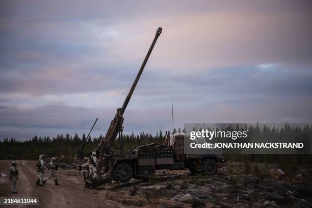 French soldiers from the 93rd mountain artillery regiment operate the Camion Equipe d'un Systeme d'Artillerie, also known as CAESAR, a French 155 mm,...
