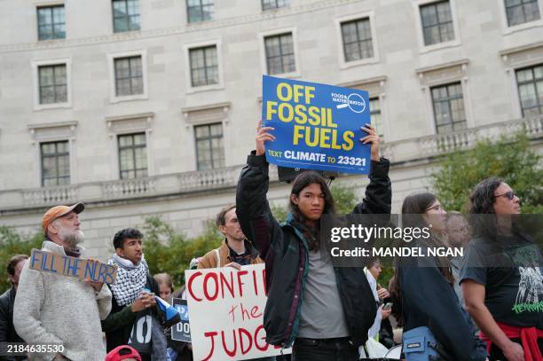 Environment Protest Rally Environmental activists rally to demand climate action before US ...