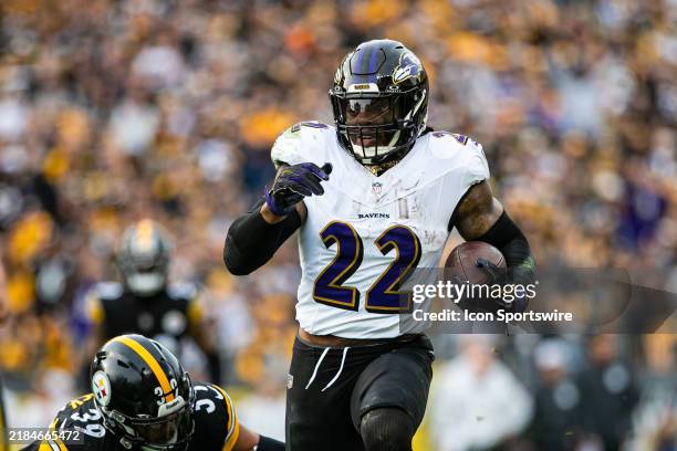Baltimore Ravens running back Derrick Henry runs with the ball during the regular season NFL football game between the Baltimore Ravens and...