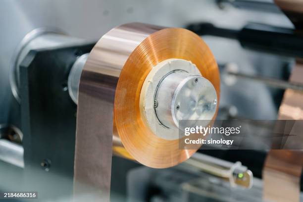 lithium battery factory is producing lithium batteries - lithium ion battery stock pictures, royalty-free photos & images