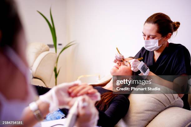 professional beauty treatments in a relaxing spa setting - beauty treatment stock pictures, royalty-free photos & images