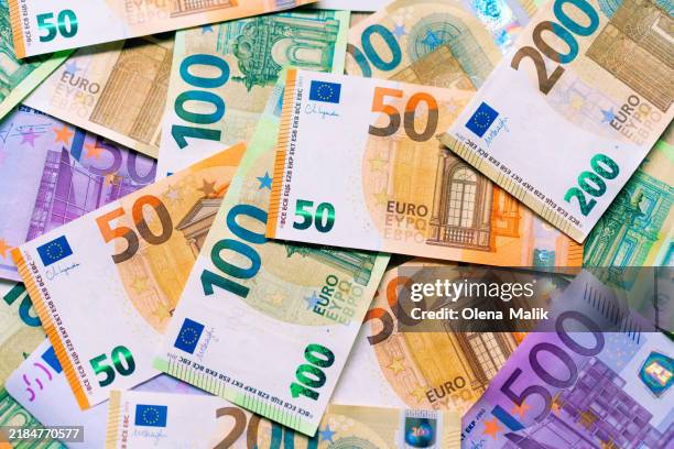 colorful euro banknotes spread - european union stock pictures, royalty-free photos & images