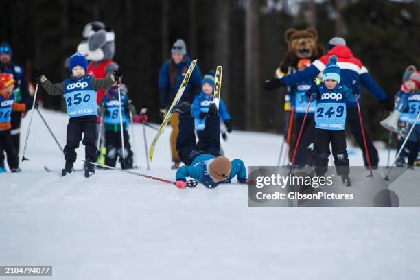 kids cross-country ski race wipe out - skier start stock pictures, royalty-free photos & images
