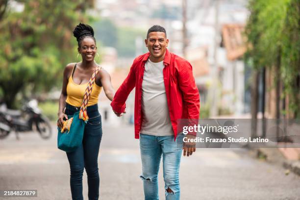 couple walking in the city - cali colombia stock pictures, royalty-free photos & images