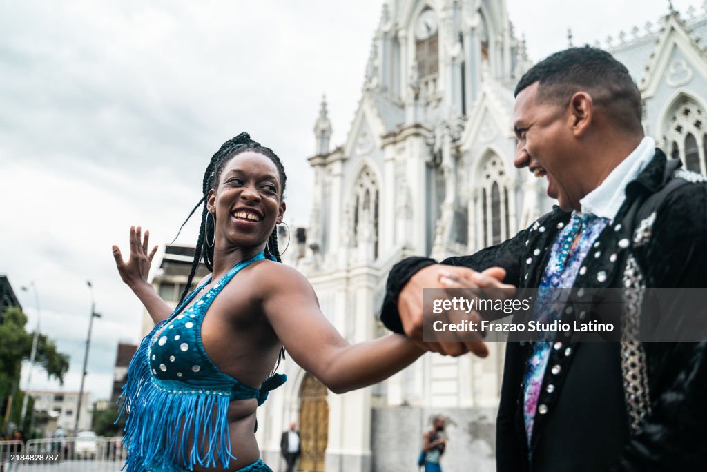 Couple of dancers dancing salsa in Cali, Colombia