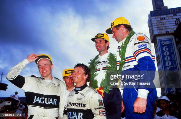 1st: Jacky Ickx / Jochen Mass Rothmans Porsche, right. 2nd: John Nielsen / Mike Thackwell / Jan Lammers TWR Jaguar, right. World Sports Prototype...