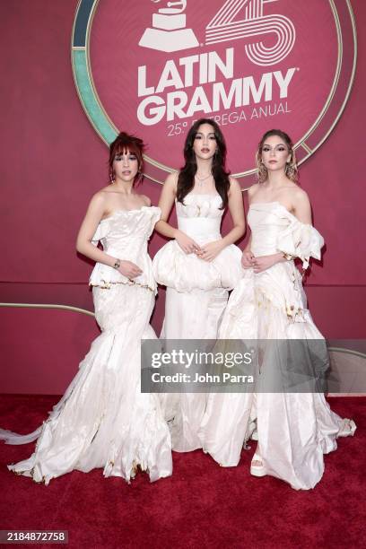 Paulina Villarreal Vélez, Alejandra Villarreal Vélez, and Daniela Villarreal Vélez attend the 25th Latin GRAMMY Awards at Kaseya Center on November...