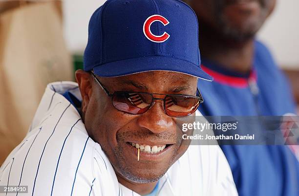 Manager Dusty Baker of the Chicago Cubs relaxes in the dugout before the Cubs take on the Atlanta Braves in a game at Wrigley Field on July 10, 2003...