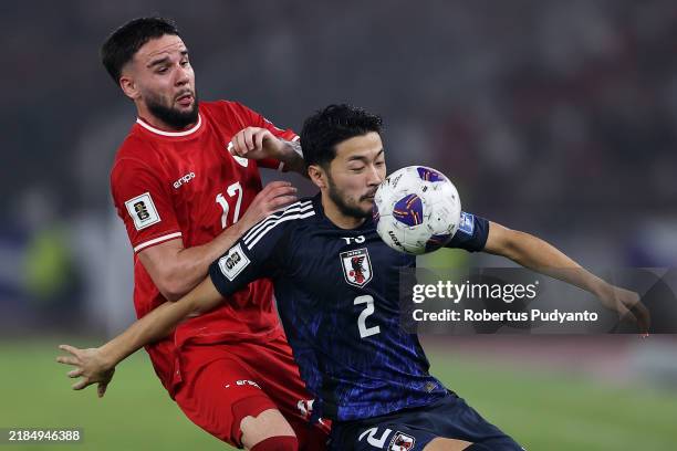 Yukinari Sugawara of Japan controls the ball against Calvin Verdonk of Indonesia in the second half during the FIFA World Cup Asian 3rd Qualifier...