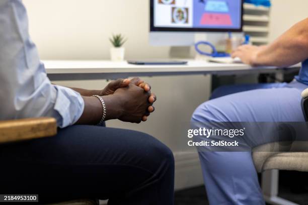 sitting in the doctor's office - unrecognisable person stock pictures, royalty-free photos & images