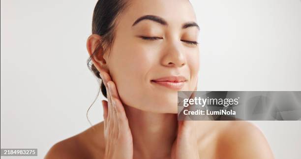 happy woman, relax and beauty with skincare for facial, cleanse or smooth skin on a white studio background. young, female person or model with spa treatment, cosmetics or exfoliation for dermatology - cheek stock pictures, royalty-free photos & images
