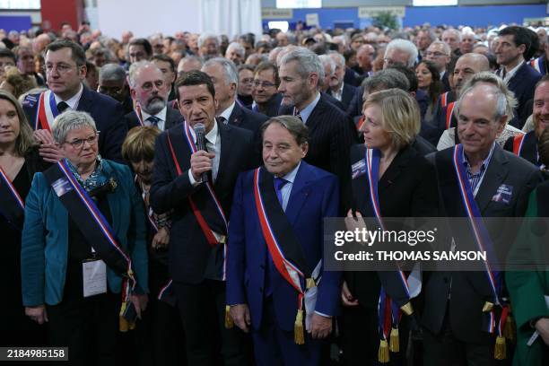 Cannes mayor and AMF president David Lisnard , AMF vice-president Andre Laignel and AMF general secretary Murielle Fabre take part in a gathering to...