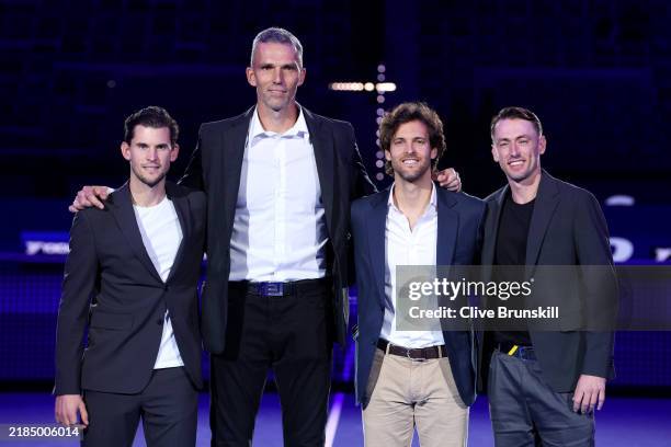 Former Tennis Players, Dominic Thiem, Ivo Karlovic, Joao Sousa and John Millman pose for a photo during day six of the Nitto ATP finals 2024 at...