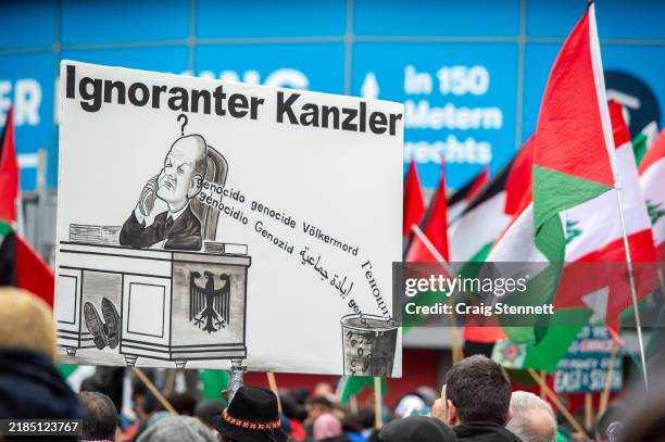 Activists protesting under the slogan Criticising Israel is not anti-Semitism demanding the withdrawal of a resolution passed in the Bundestag to...