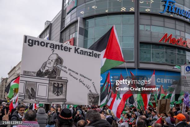 Activists protesting under the slogan Criticising Israel is not anti-Semitism demanding the withdrawal of a resolution passed in the Bundestag to...
