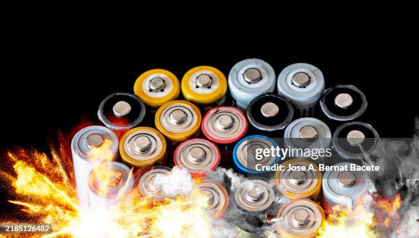 explosion of ni-mh rechargeable batteries. - lithium stock pictures, royalty-free photos & images
