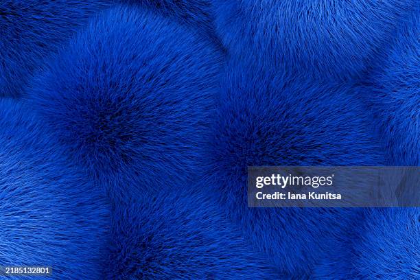 navy blue fluffy fur background. 3d cute balls pattern. empty backdrop for text, design element, copy space. - pelliccia-materiale-tessile foto e immagini stock