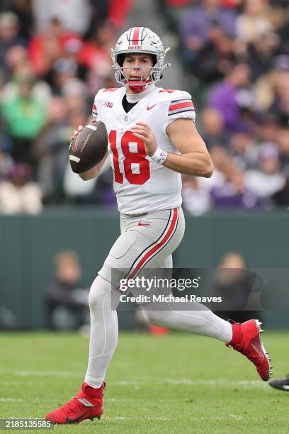 Will Howard of the Ohio State Buckeyes looks to pass against the Northwestern Wildcats during the first half at Wrigley Field on November 16, 2024 in...