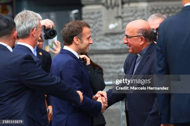 President of France Emmanuel Macron shakes hands with Cardinal Fernando Chomali, Archbishop of Santiago, during official visit to Chile on November...