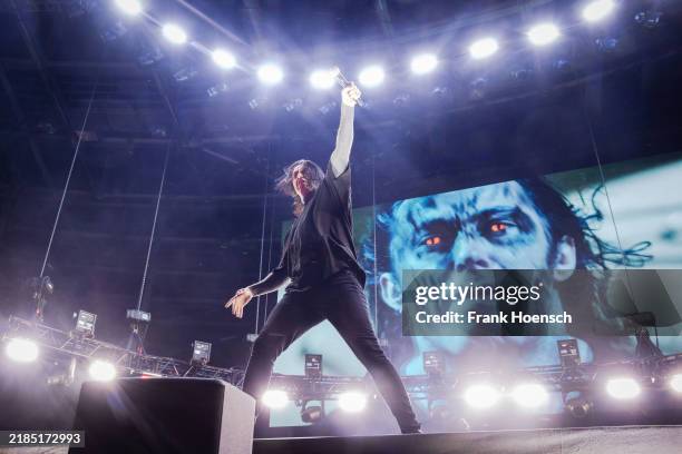 Singer Ronnie Radke of Falling In Reverse performs live on stage during a concert at the Velodrom on November 20, 2024 in Berlin, Germany.